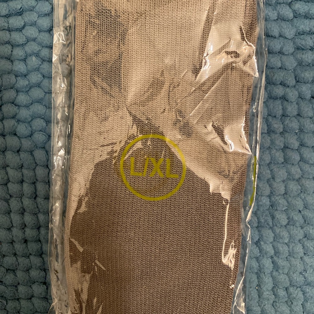 Brand new unopened compression socks.
